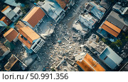 Aerial view of earthquake destruction in a residential area, highlighting the consequences of natural disasters. For educational, urban planning, and emergency response materials. Стоковое AI-изображение, AI-художник Лариса Пономарева / Фотобанк Лори