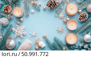 Elegant Winter Solstice Festive Arrangement: Candles, Pine Cones, and Ornaments on a Blue Background. Стоковое AI-изображение, AI-художник Данила Большаков / Фотобанк Лори