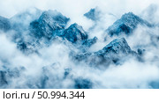 Enigmatic Blue Mountains Shrouded in Mist: A Breathtaking Aerial Landscape. Стоковое AI-изображение, AI-художник Данила Большаков / Фотобанк Лори