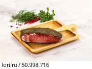 Delicous tasty dry pork jerky. Стоковое фото, фотограф Андрей Старостин / Фотобанк Лори
