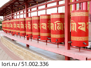 Elista, capital of Republic of Kalmykia, Russia, July, 4, 2025: Prayer drums of khurul, Buddhist temple Golden Abode of Buddha Shakyamuni, largest Buddhist temple in Europe. Редакционное фото, фотограф Екатерина Топорова / Фотобанк Лори