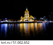 Radisson Collection Hotel in Moscow, Stalin Era skyscraper, former hotel Ukraine at night cityscape. Редакционное фото, фотограф Константин Григорьев / Фотобанк Лори