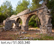 Remains of aquaeduct in ancient Lycian city Faselis. Стоковое фото, фотограф Яков Филимонов / Фотобанк Лори