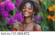 A young woman with stylish locs wears a colorful outfit and smiles amidst a stunning garden filled with bright flowers, radiating joy and beauty. Стоковое AI-видео, аниматор Данила Большаков / Фотобанк Лори