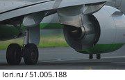 Aircraft engine close-up showcasing intricate design and engineering details in aviation technology. Стоковое видео, видеограф Данил Руденко / Фотобанк Лори