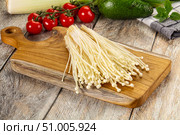 Raw enoki mushroom for cooking. Стоковое фото, фотограф Андрей Старостин / Фотобанк Лори