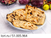 Indian stuffed potato bread Paratha. Стоковое фото, фотограф Андрей Старостин / Фотобанк Лори