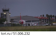 Passenger boarding stairs moving away from parked airplane. Стоковое видео, видеограф Данил Руденко / Фотобанк Лори
