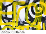 Yellow and Black Graffiti Swirl Design with Bold Lines for Urban 2000s Style. Стоковое фото, фотограф Александра Конопля / Фотобанк Лори