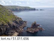 Irish Lady Rock with the Gamper bay on the background. Cornwall. England. GB (2009 год). Стоковое фото, фотограф Сергей Пристяжнюк (Serg Zastavkin) / Фотобанк Лори