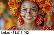 A woman adorned with flowers and intricate makeup celebrates Día de los Muertos, embodying cultural traditions and festive spirit in a lively atmosphere. Стоковое AI-видео, аниматор Данила Большаков / Фотобанк Лори