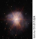 Arp 220 lights up the night sky 250 million light-years away in the constellation of Serpens. Стоковое фото, фотограф Stocktrek Images, Inc. / ТАСС / Фотобанк Лори