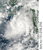 Cyclone Giri moves ashore over Burma. Стоковое фото, фотограф Stocktrek Images, Inc. / ТАСС / Фотобанк Лори