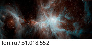 A colony of hot young stars in the Orion Nebula. Стоковое фото, фотограф Stocktrek Images, Inc. / ТАСС / Фотобанк Лори