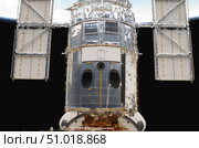 A portion of the Hubble Space Telescope locked down in the cargo bay of Space Shuttle Atlantis. Стоковое фото, фотограф Stocktrek Images, Inc. / ТАСС / Фотобанк Лори