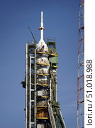 The Soyuz rocket is erected into position at the launch pad at the Baikonur Cosmodrome in Kazakhstan (2009 год). Стоковое фото, фотограф Stocktrek Images, Inc. / ТАСС / Фотобанк Лори
