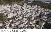 Aerial townscape of Casares, Malaga province, autonomous community of Andalusia, Spain. Стоковое видео, видеограф Яков Филимонов / Фотобанк Лори