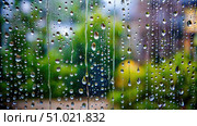 Raindrops On Window Pane During Summer Rain Shower. Generative AI. Стоковое AI-изображение, AI-художник Roman Zavorotny / Фотобанк Лори