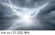 Dramatic clouds reflect on shiny surface leading to bright horizon. Стоковое AI-изображение, AI-художник Katsiaryna Repich / Фотобанк Лори