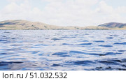 Lake Bannoe, Russian Federation - July 31, 2025: Serene lake view with gentle ripples reflecting clouds and distant hills under a bright blue sky, showcasing natural beauty and tranquility. Редакционное видео, видеограф Ирина Ручушкина / Фотобанк Лори