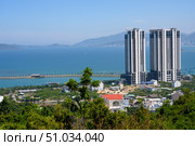 View from the mountain to the city of Nha Trang, Vietnam, with skyscrapers on the shore of the Gulf of the South China Sea. Стоковое фото, фотограф Сергей Фролов / Фотобанк Лори