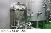 Metallic cisterns for processing and fermentating wine in fabric shop. Стоковое видео, видеограф Яков Филимонов / Фотобанк Лори