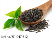 Dry black tea leaves in a wooden spoon isolated on white background. Pile of Dried fermented tea. Black Tea Leaves Heap. Close Up, Macro. Texture. Copy Space. Dried Tea. Abstract Food Drink Backdrop. Стоковое AI-изображение, AI-художник Марина Демидюк / Фотобанк Лори