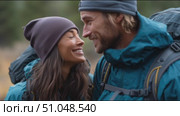 Couple enjoying nature during a hiking adventure in the mountains on a sunny day. Стоковое AI-видео, аниматор Сергей Толмачёв / Фотобанк Лори