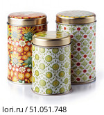 Three Floral Patterned Tea Tin Canisters on a White Background. Generative AI. Стоковое AI-изображение, AI-художник Roman Zavorotny / Фотобанк Лори