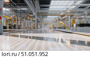 Modern factory interior showcasing advanced robotics and automation technology in a spacious manufacturing facility. Стоковое AI-видео, аниматор Сергей Толмачёв / Фотобанк Лори