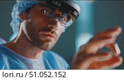 Advanced technology in surgical procedures enhances precision and outcomes in modern operating rooms. Стоковое AI-видео, аниматор Сергей Толмачёв / Фотобанк Лори