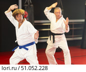 Man with other athletes of different ages during karate classes. Стоковое фото, фотограф Яков Филимонов / Фотобанк Лори