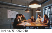 Collaborative Team Meeting in a Modern Workspace Featuring Interactive Discussion and Visual Aids on a Whiteboard, Fostering Creativity and Innovation. Стоковое AI-видео, аниматор Владимир Федоров / Фотобанк Лори
