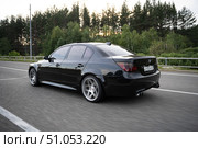 KRASNOYARSK, RUSSIA - July 31, 2025: Black BMW M5 E60. Редакционное фото, фотограф Плотников Дмитрий / Фотобанк Лори