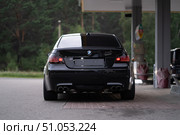 KRASNOYARSK, RUSSIA - July 31, 2025: Black BMW M5 E60. Редакционное фото, фотограф Плотников Дмитрий / Фотобанк Лори