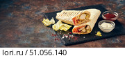 Eastern traditional shawarma with sauces. Стоковое фото, фотограф Ирина Буракова / Фотобанк Лори