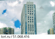 one skyscraper and high buildings in the city. Стоковое фото, фотограф Андрей Митин / Фотобанк Лори