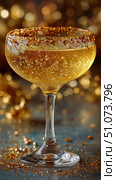 Sparkling Golden Cocktail With Glimmering Garnishments at a Celebratory Gathering. Стоковое AI-изображение, AI-художник Юлия Гапеенко / Фотобанк Лори