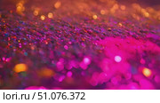 Festive Glamour: A Dazzling Abstract of Magenta Glitter and Golden Bokeh. Ideal for celebration print or wallpaper. Стоковое AI-видео, аниматор Данила Большаков / Фотобанк Лори
