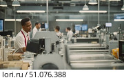 Modern Factory Floor: Diverse Team of Professionals Working on an Efficient Production Line. Industrial and corporate concept. Стоковое AI-видео, аниматор Данила Большаков / Фотобанк Лори