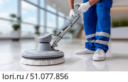 Professional cleaning service uses scrubber on shiny floor in office setting. Стоковое AI-изображение, AI-художник Katsiaryna Repich / Фотобанк Лори
