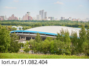 Moscow, Russia. - May 26, 2025: View of Moscow's high-rise buildings and stadiums from the Krylatsky Hills. Редакционное фото, фотограф Наталия Кирсанова / Фотобанк Лори