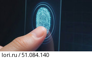 A close-up of a human finger touching a digital screen displaying a fingerprint scanner. The scene emphasizes technology and security features. Стоковое AI-видео, аниматор Nart / Фотобанк Лори