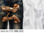 Glamorous women's fashion, jeans, shoes in rhinestones. Стоковое фото, фотограф Александр Собко / Фотобанк Лори
