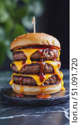 A Towering Triple Cheeseburger Dripping with Flavor: Savory Patties, Melted Cheese, and Zesty Sauce Create the Ultimate Burger Indulgence. Стоковое AI-видео, аниматор Владимир Федоров / Фотобанк Лори