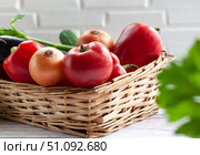 Various vegetables in a wicker basket. Food. Tomatoes, onions, peppers, cucumbers. Стоковое фото, фотограф Анастасия  Гудантова / Фотобанк Лори