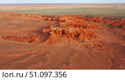 Bayanzag flaming cliffs at sunset in Mongolia. Стоковое фото, фотограф Михаил Коханчиков / Фотобанк Лори