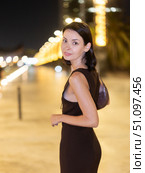 At night, smiling girl walks around old city district Barceloneta, in vicinage of Citadel Park. Стоковое фото, фотограф Яков Филимонов / Фотобанк Лори