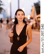 In evening, girl walks around old city district Barceloneta, pedestrian embankment. Стоковое фото, фотограф Яков Филимонов / Фотобанк Лори