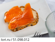 canapes with delicate butter and pieces of bright pink salmon. Стоковое фото, фотограф Яков Филимонов / Фотобанк Лори